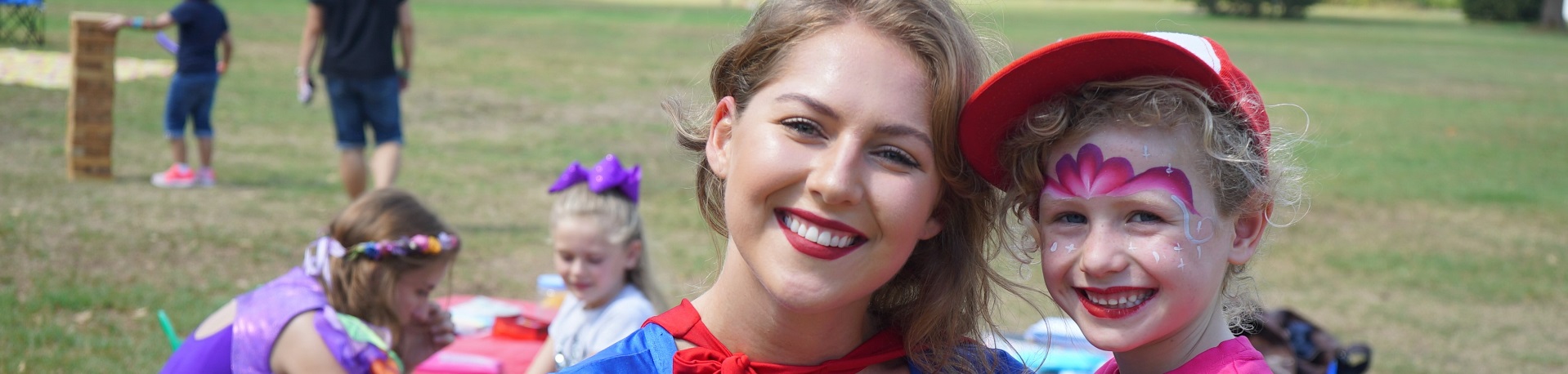 image of Supergirl as kids party entertainer for corporate events with Superheroes Inc